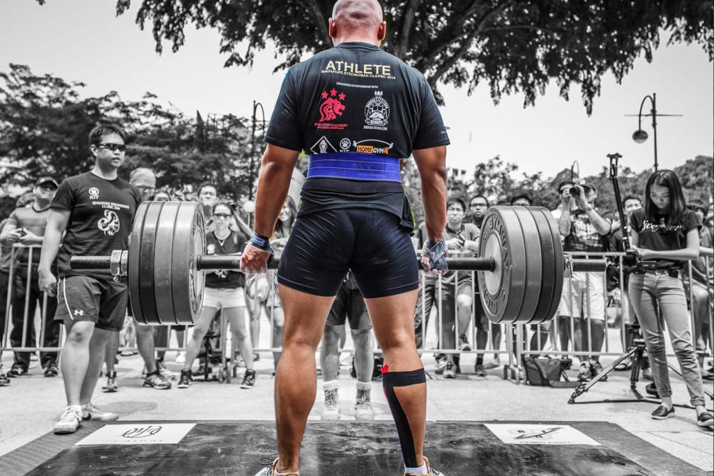 Strongman competitor Sulaiman Ismail doing deadlifts at Singapore Strongman Challenge